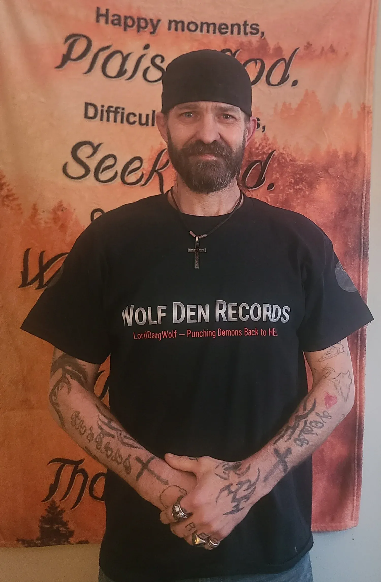 LordDawgWolf in a Wolf Den Records shirt